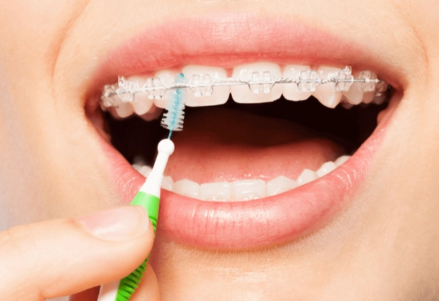 how to clean between teeth