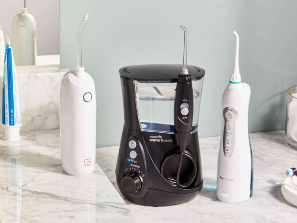 oral irrigator vs flossing