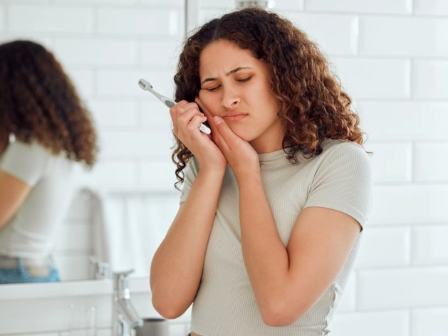 what causes sensitive teeth