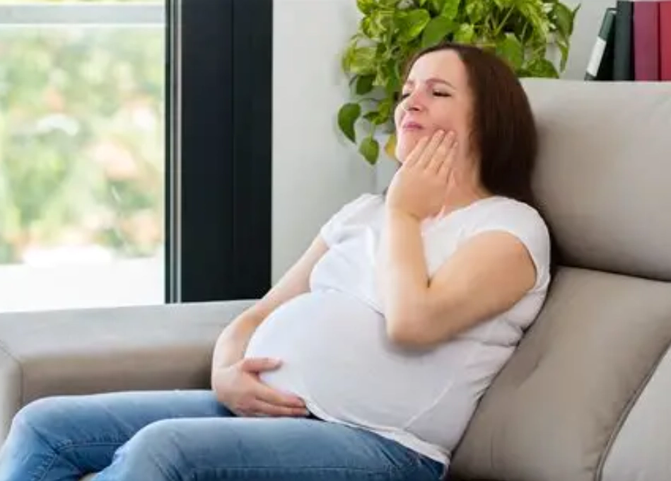 What causes toothache during pregnancy?